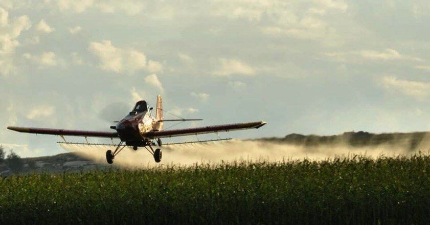 Mosquito plane flying over Hayden